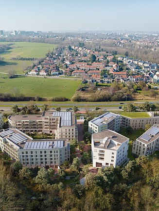 A rendered aerial view of WOL U, a large-scale residential project in Zaventem.