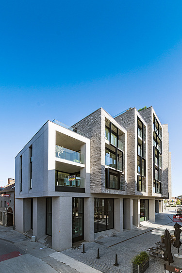 Foto van de voorgevel van residentie Books aan het Kolonel Dusartplein in Hasselt.