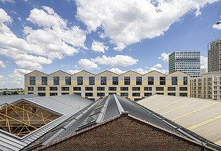Photo of the shed roofs and the new Stemstroom building at Campus Cadix in Antwerp.