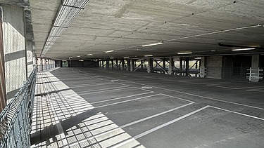 Image de synthèse de MobHub, un parking de neuf étages dans le parc Arenberg à Heverlee.