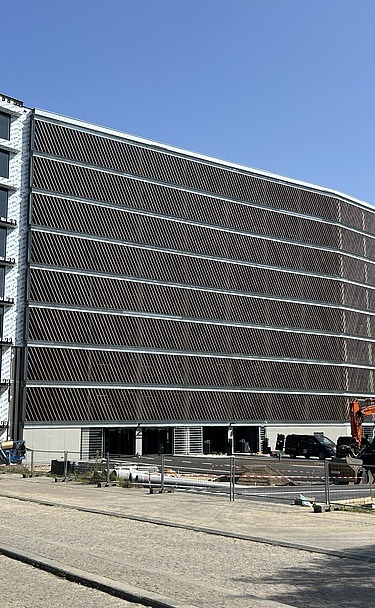 Image de synthèse de MobHub, un parking de neuf étages dans le parc Arenberg à Heverlee.