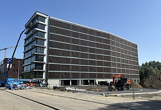 Image de synthèse de MobHub, un parking de neuf étages dans le parc Arenberg à Heverlee.