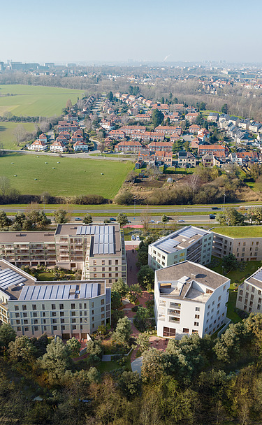 Image de synthèse du nouveau complexe WOL-U, un nouveau complexe résidentiel à grande échelle à Zaventem.
