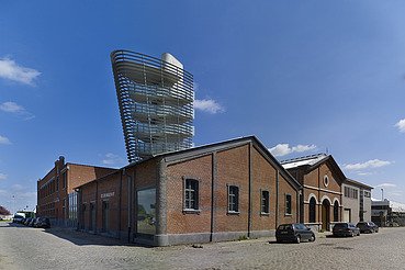 Photo of the Red Star Line Museum with its striking viewing tower resembling the mantel of a cruise ship.