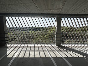 Render image of MobHub, a nine-storey parking facility in Heverlee's Arenberg Park.