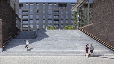 Photo de détail du Quartier Bleu sur le Kanaalkom à Hasselt, un projet de développement multifonctionnel à grande échelle.