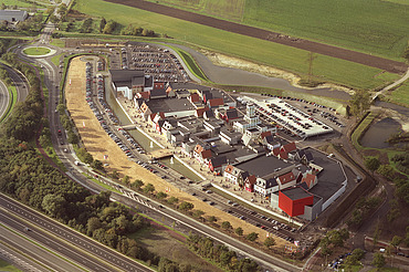 Aerial view of the Factory Outlet Center Rosada in Roosendaal: a modern shopping complex.