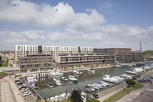 Foto van Quartier Bleu aan de Kanaalkom in Hasselt, een grootschalig multifunctioneel ontwikkelingsproject.