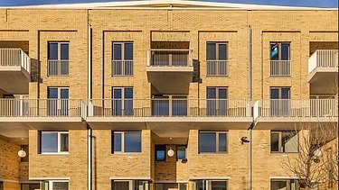 Foto van Amsterdam-residentie van Cadix A5, een grootschalig wooncomplex aan de Kattendijkdok in Antwerpen.