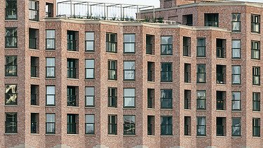 Foto van New York-residentie van Cadix A5, een grootschalig wooncomplex aan de Kattendijkdok in Antwerpen.