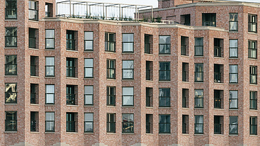 Photo de la résidence New York de Cadix A5, un complexe résidentiel à grande échelle situé sur le Kattendijkdok à Anvers.