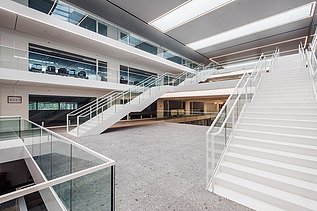Photo of the central grand staircase in T2 Campus at Thor Park in Genk.