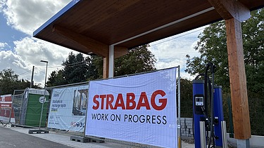 Photo d'une station de chargement Storm/Q8 à Dinant.
