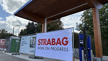 Photo d'une station de chargement Storm/Q8 à Dinant.