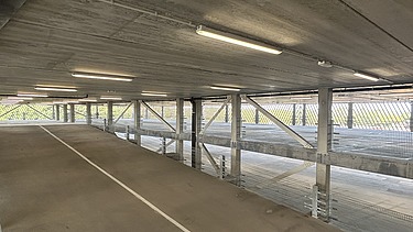 Render image of MobHub, a nine-storey parking facility in Heverlee's Arenberg Park.