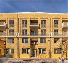 Foto van Amsterdam-residentie van Cadix A5, een grootschalig wooncomplex aan de Kattendijkdok in Antwerpen.